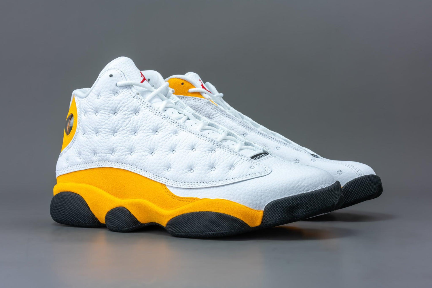 Black and yellow air hotsell jordan 13